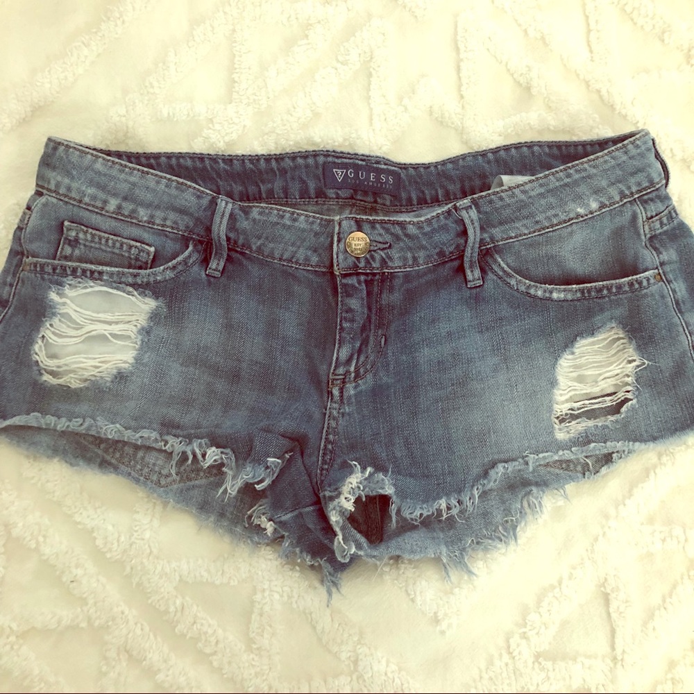 Guess distressed low rise jean shorts size 28 & 29